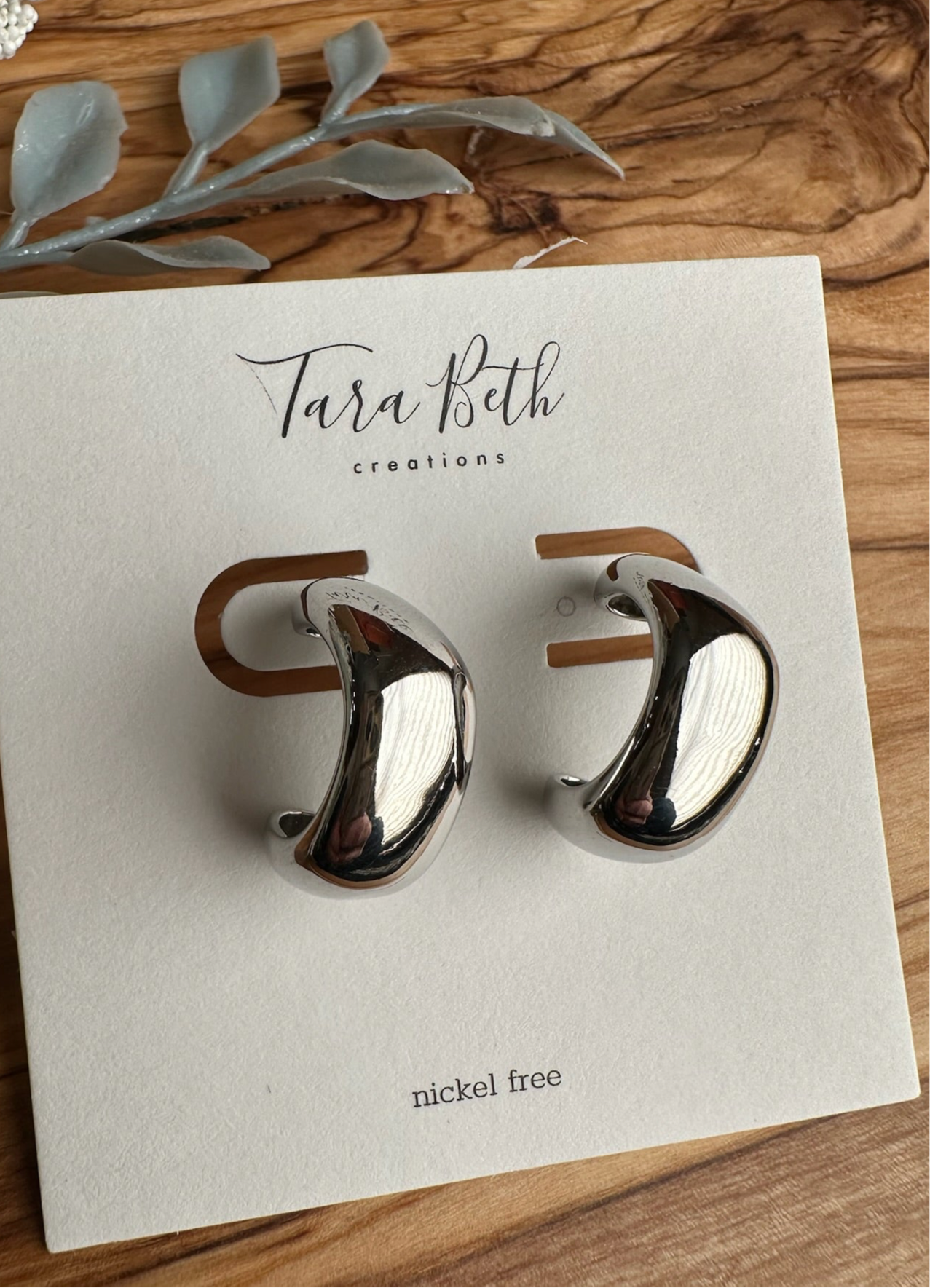 front view Silver Bubble Hoop with modern bubble design, silver coloring, secure stud closure, and nickel-free for sensitive ears