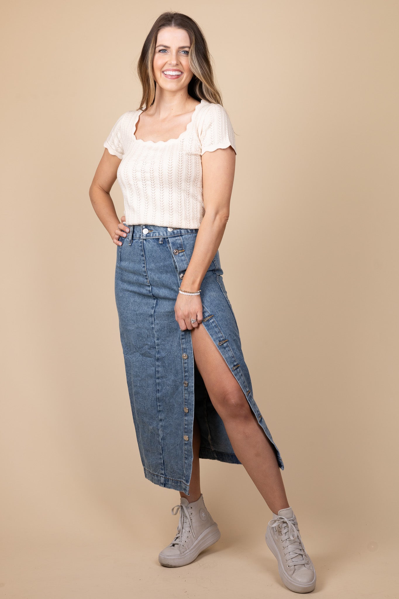 Taylor Denim Midi Skirt in dark wash with button-down design, high-rise fit, and midi length, perfect for any occasion.