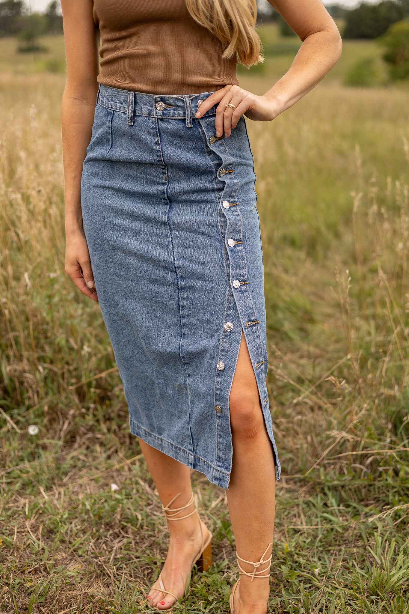 front view of denim midi skirt with side buttons all the way down