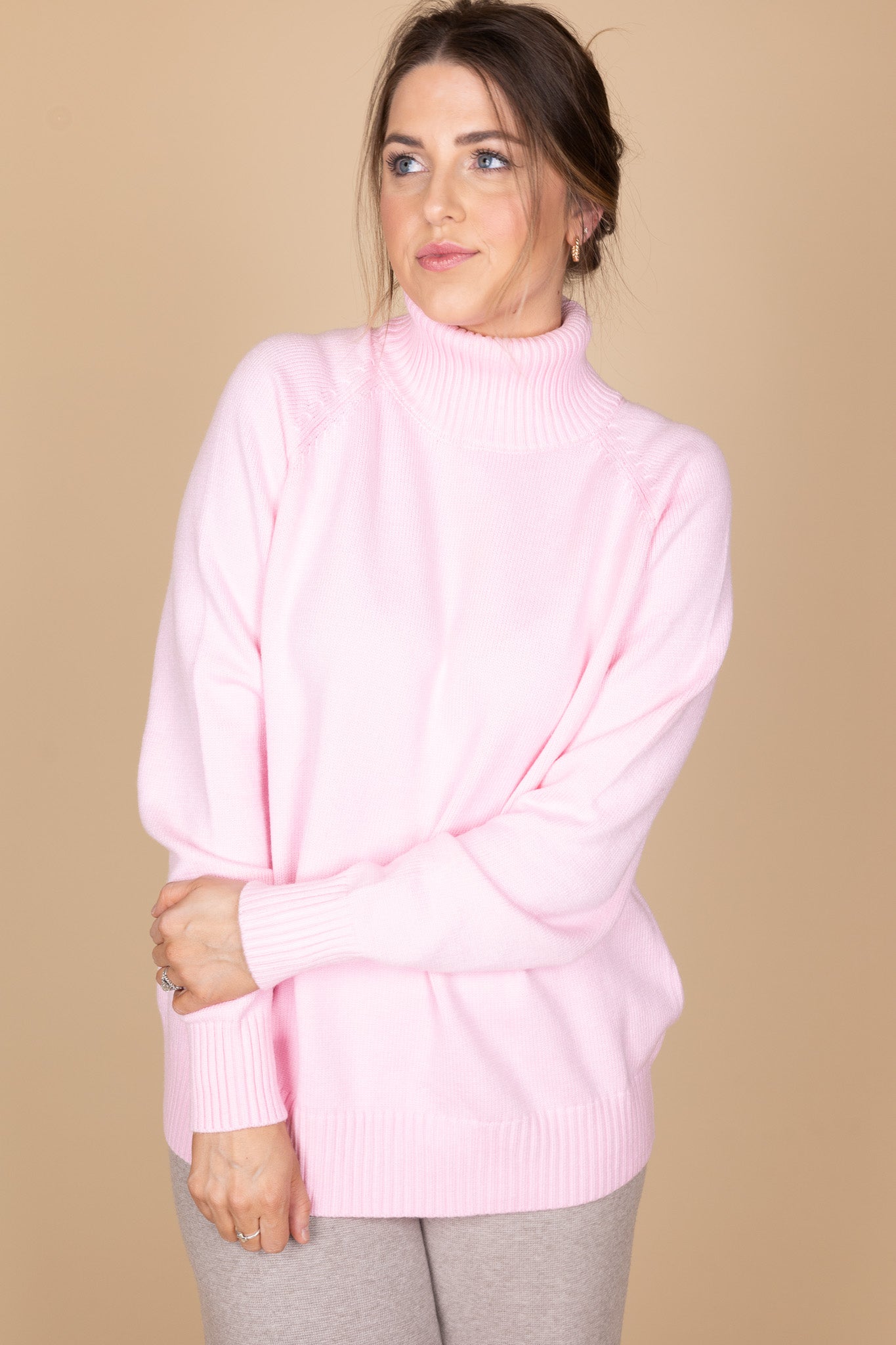 “Cotton Candy Oversized Knit – a cozy, oversized pink sweater with a soft, warm knit fabric for a playful yet stylish look.”