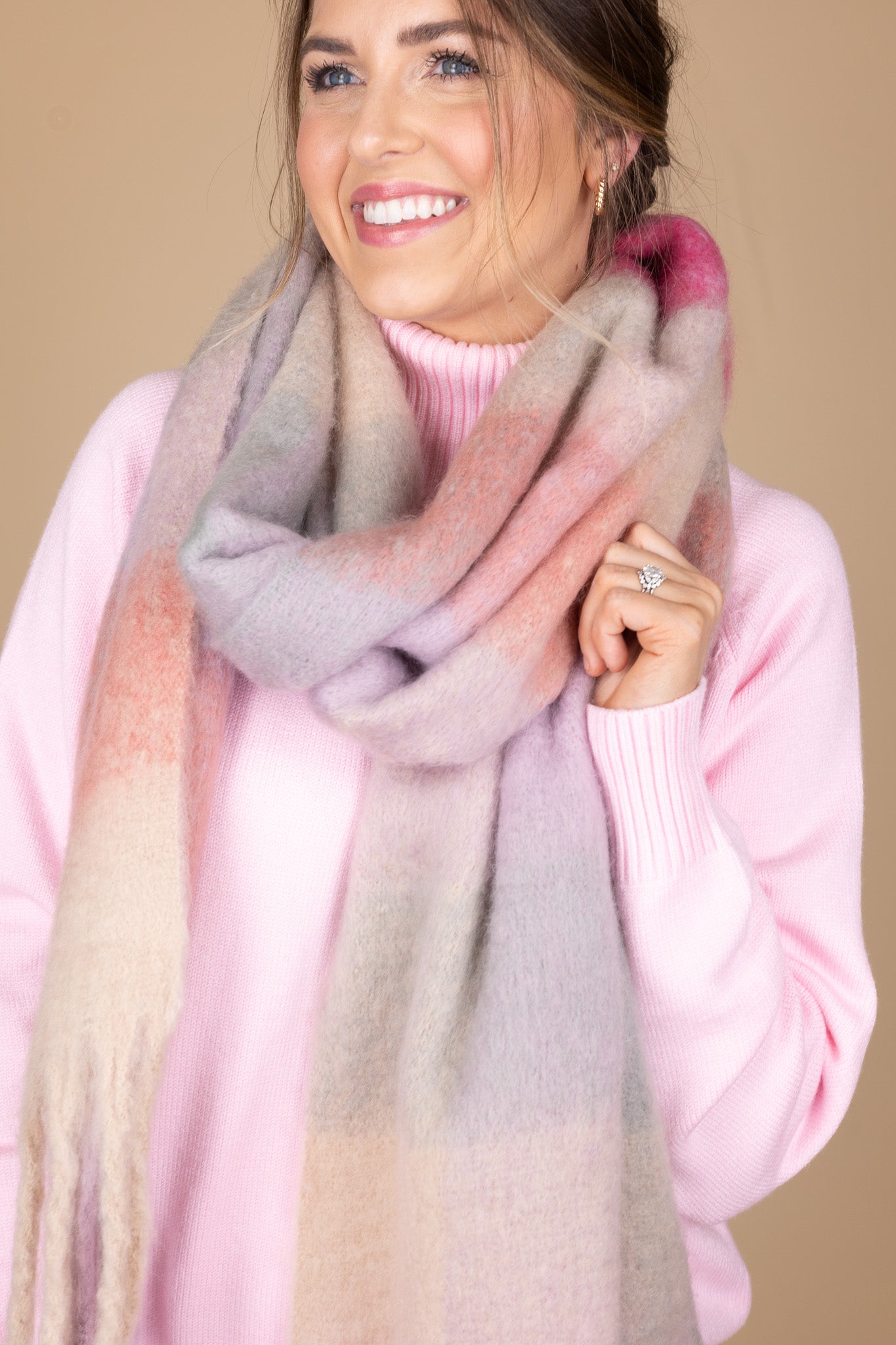 scarf view of “Cotton Candy Oversized Knit – a cozy, oversized pink sweater with a soft, warm knit fabric for a playful yet stylish look.”