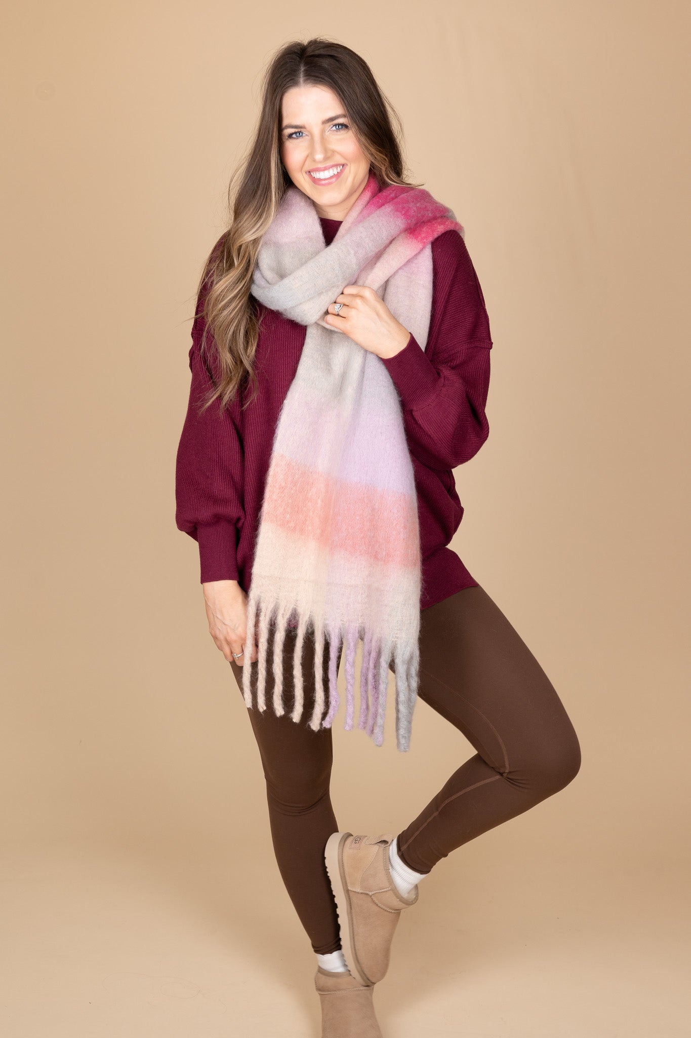 scarf view of “Cozy Crewneck Sweater in Wine Red – a soft, oversized knit sweater with a classic crewneck design for effortless style.”