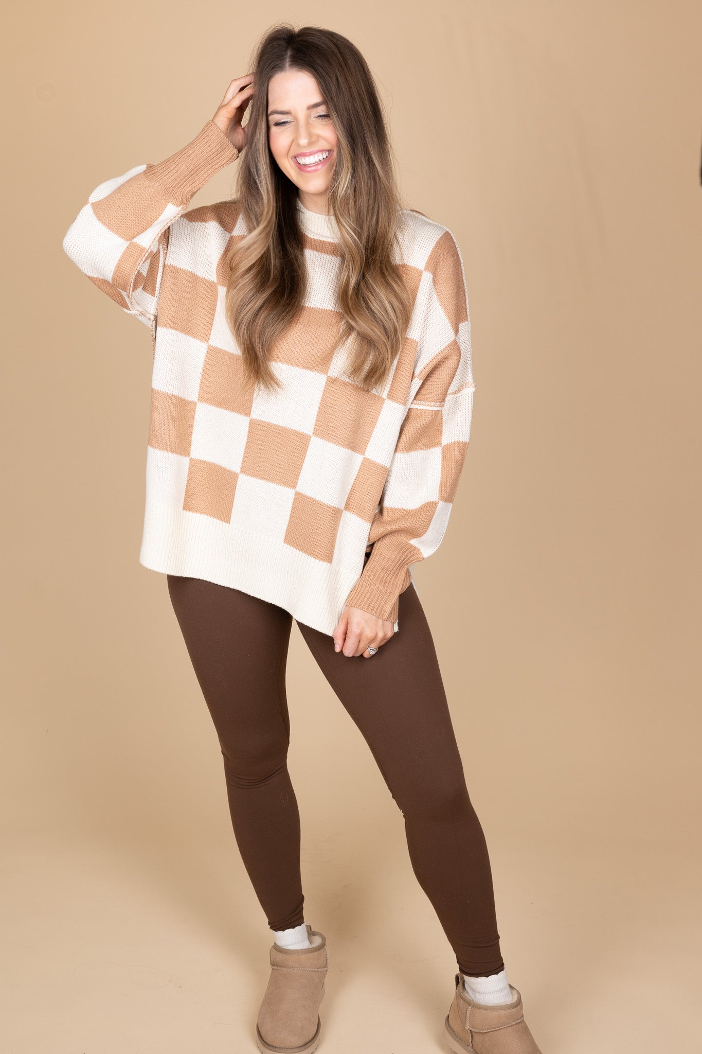 “Cozy Checkered Crewneck Sweater – a soft knit sweater with a stylish checkered pattern and relaxed fit for effortless comfort.”