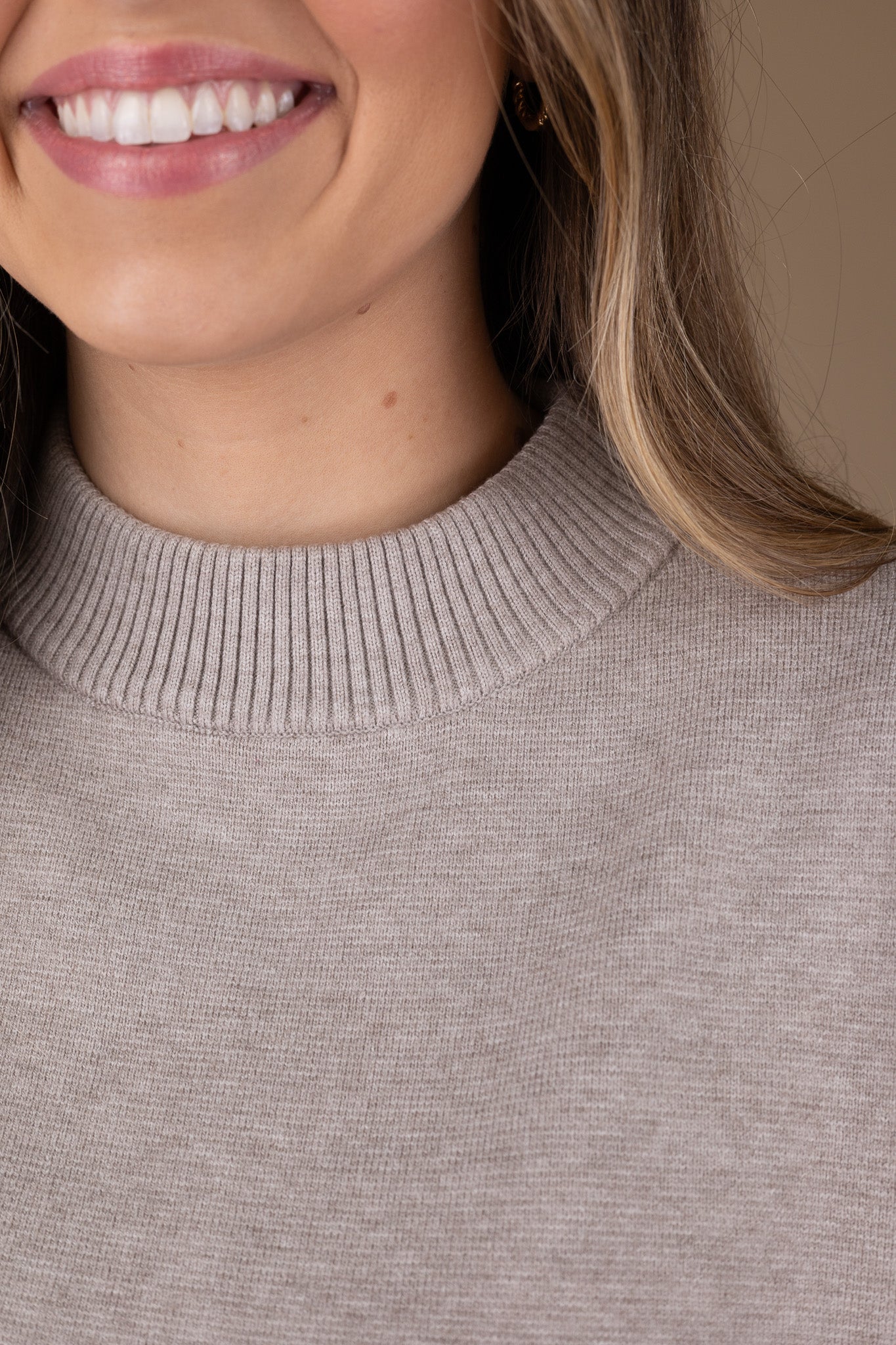 neckline of “Clara Comfort Set – a soft, breathable two-piece lounge set with a relaxed fit for effortless style and comfort.”