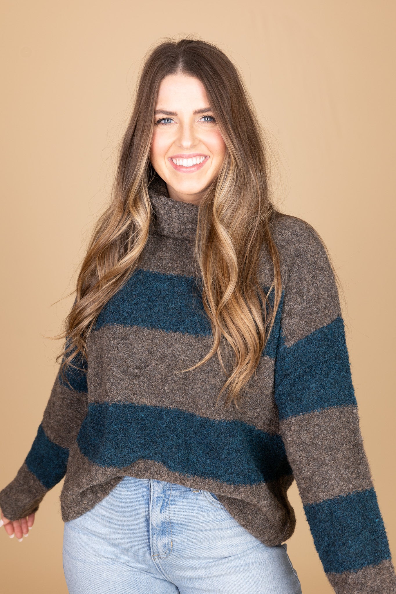 “Steph Bold Stripe Sweater – a cozy and stylish knit sweater with vibrant, eye-catching stripes.”