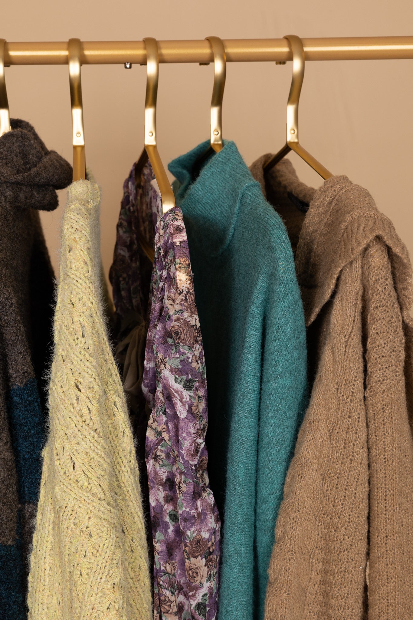 hangered view of “Ava Scalloped Knit Cardigan – a soft and elegant knit cardigan with delicate scalloped edges for a feminine touch.”