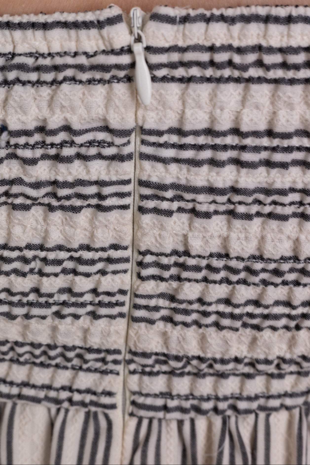 back zipper Linnley Linen Striped Maxi Dress with black and cream stitched stripe print, smocked backing, functional pockets, and bow tie straps