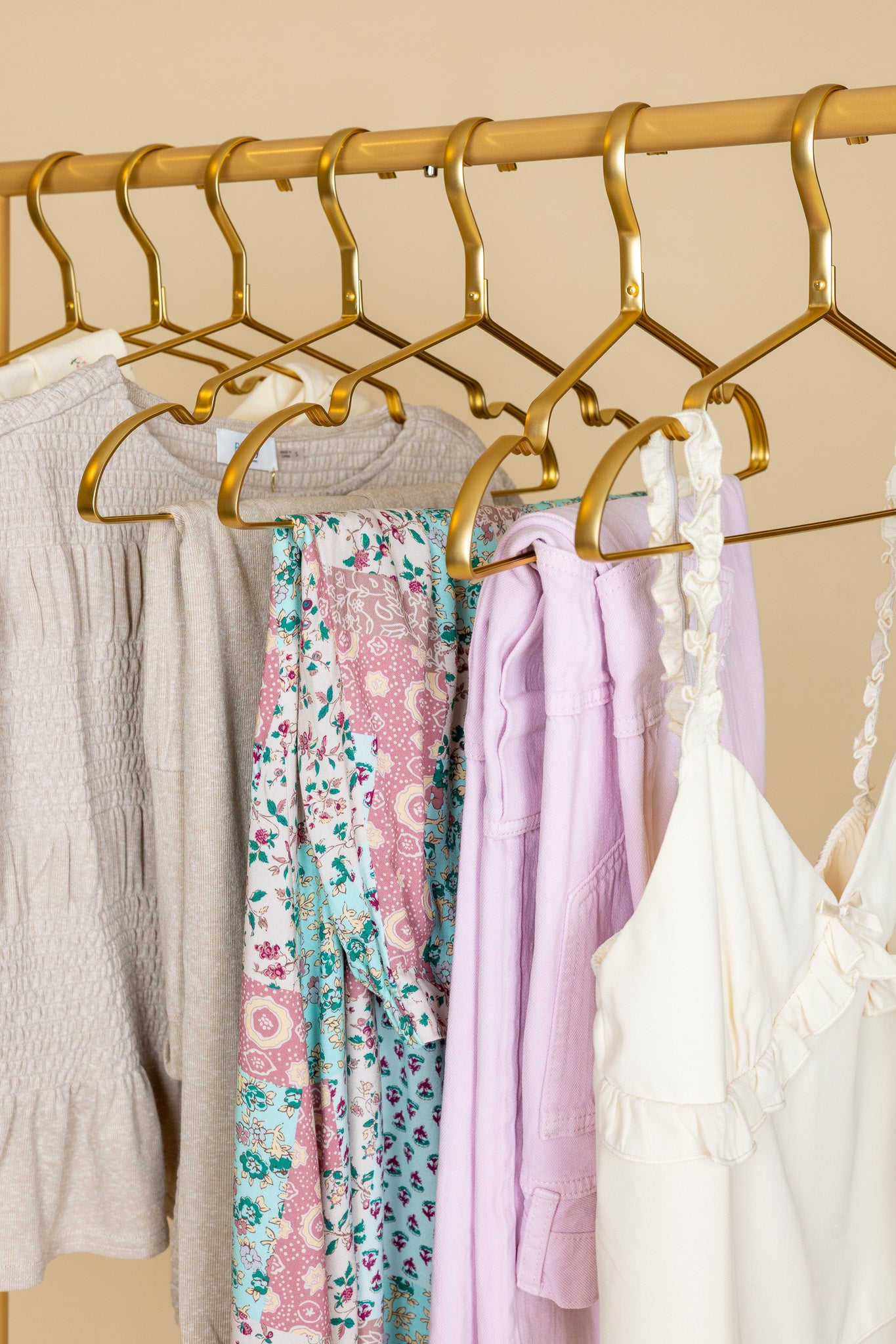 gold hanger Paisley Patchwork Maxi Skirt with floral patchwork design, stretch waistband, and flowy silhouette in lightweight fabric