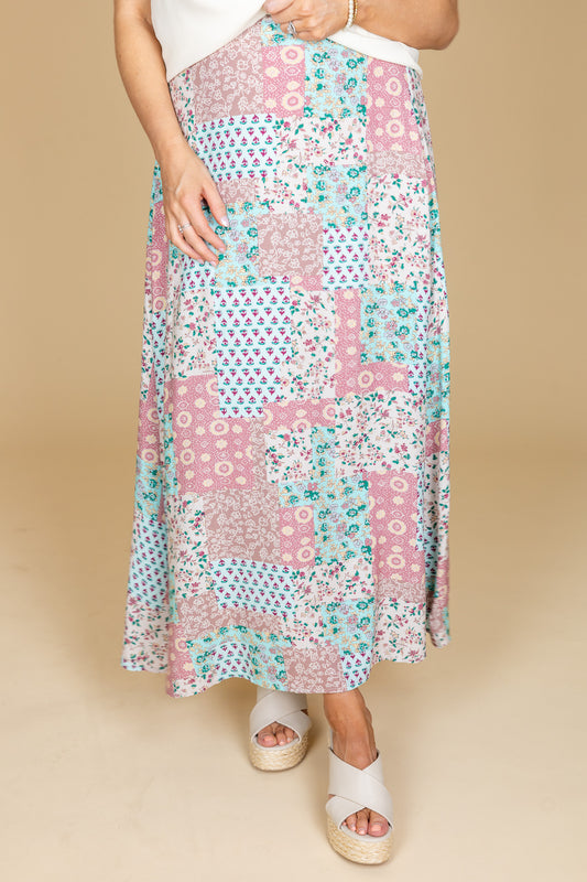 close up Paisley Patchwork Maxi Skirt with floral patchwork design, stretch waistband, and flowy silhouette in lightweight fabric