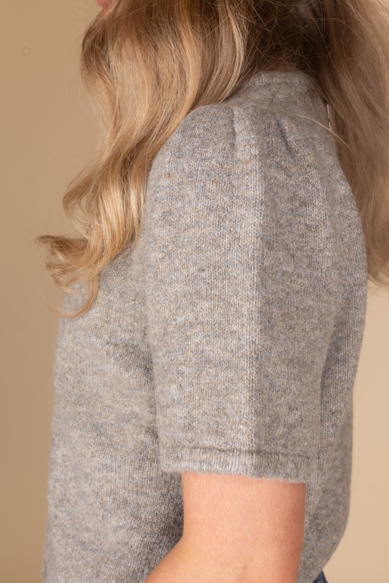 sleeve detail of Women’s short sleeve puff sleeve cardigan in heathered grey-brown with functional buttons — versatile layering sweater from ELLX Boutique