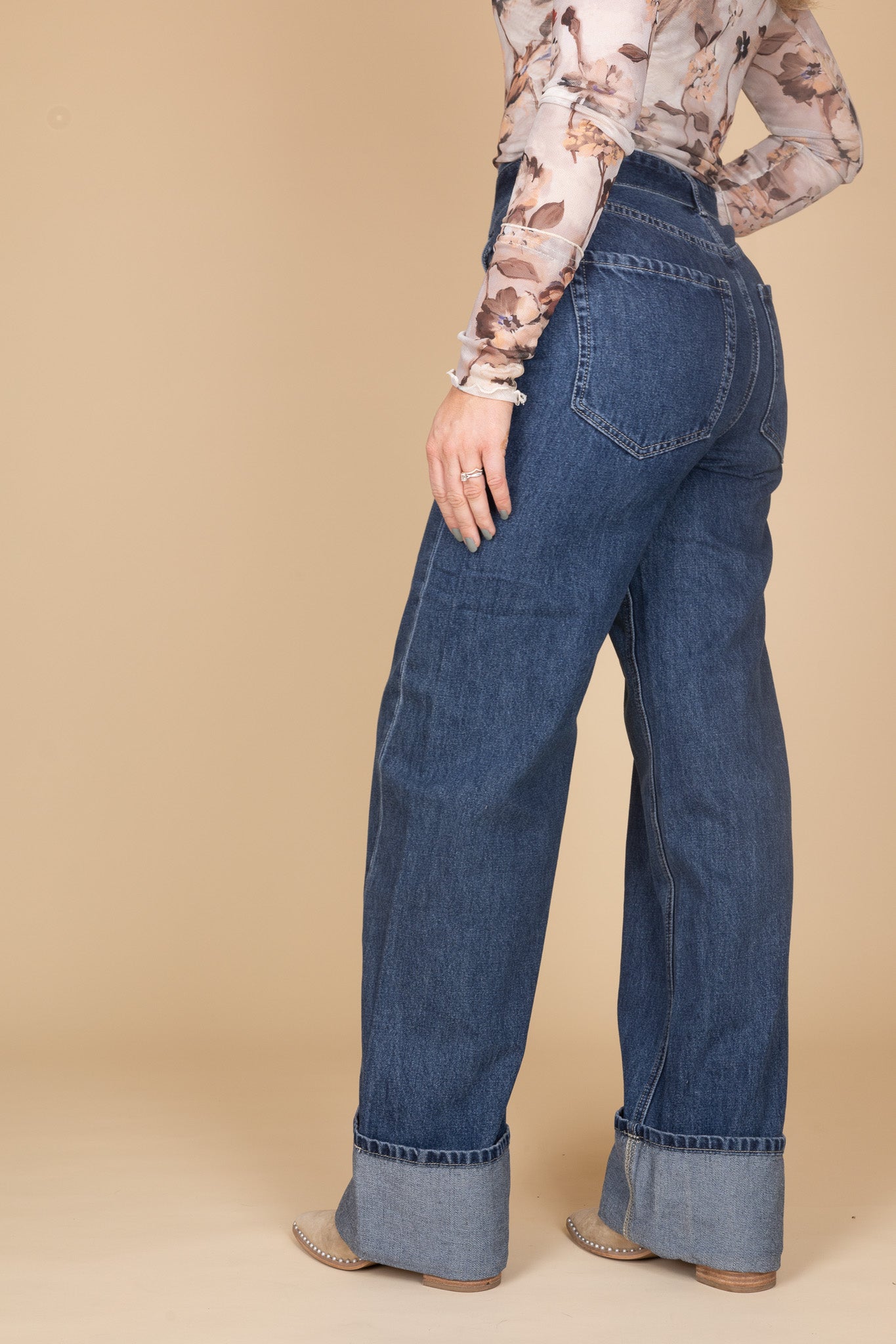 Trendy women’s fall outfit featuring dark wash cuffed wide leg jeans and chic neutral top — ELLX Boutique style