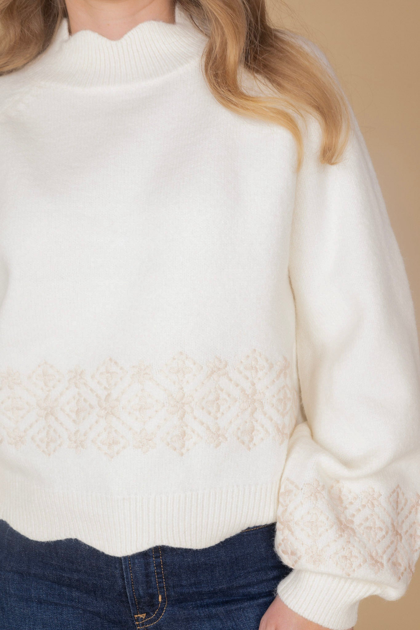 Women’s cream mock neck sweater with scalloped detail, pink floral embroidery, and balloon sleeves — ELLX Boutique knitwear