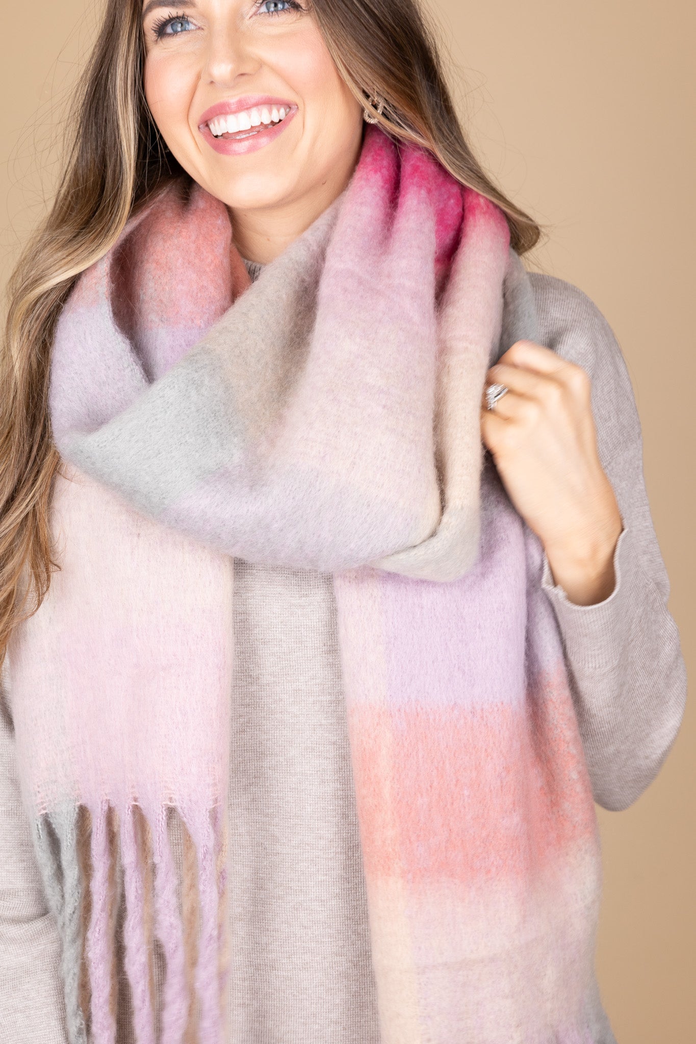 close up view of “Ella Ombre Blanket Scarf – a soft and stylish oversized scarf with a beautiful ombre gradient for layering.”

