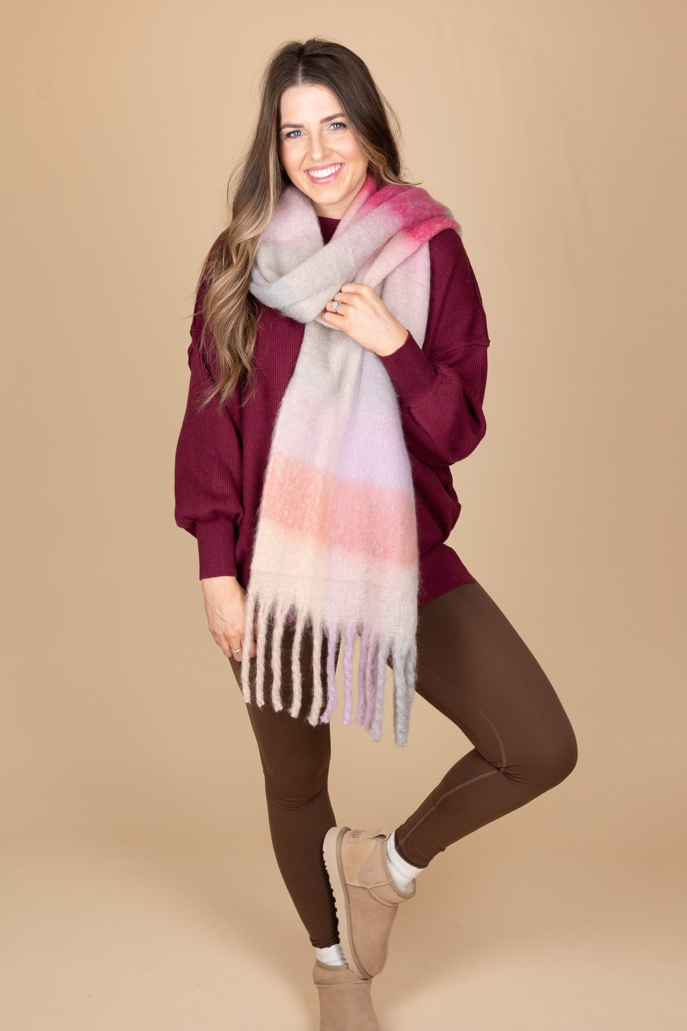 red top with “Ella Ombre Blanket Scarf – a soft and stylish oversized scarf with a beautiful ombre gradient for layering.”

