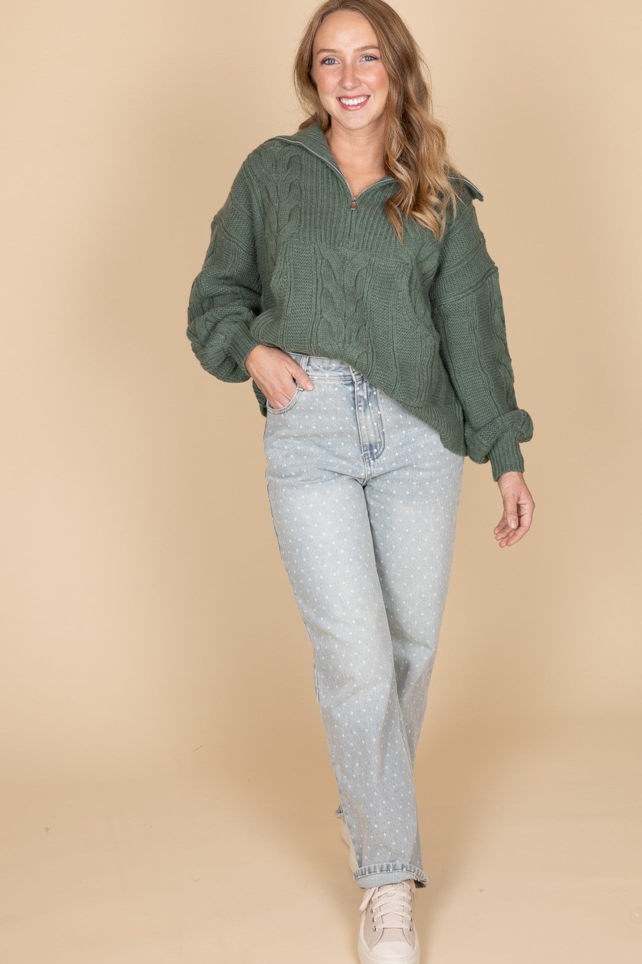 Oversized cable knit quarter zip sweater in deep sage green — women’s cozy fall pullover with pocket