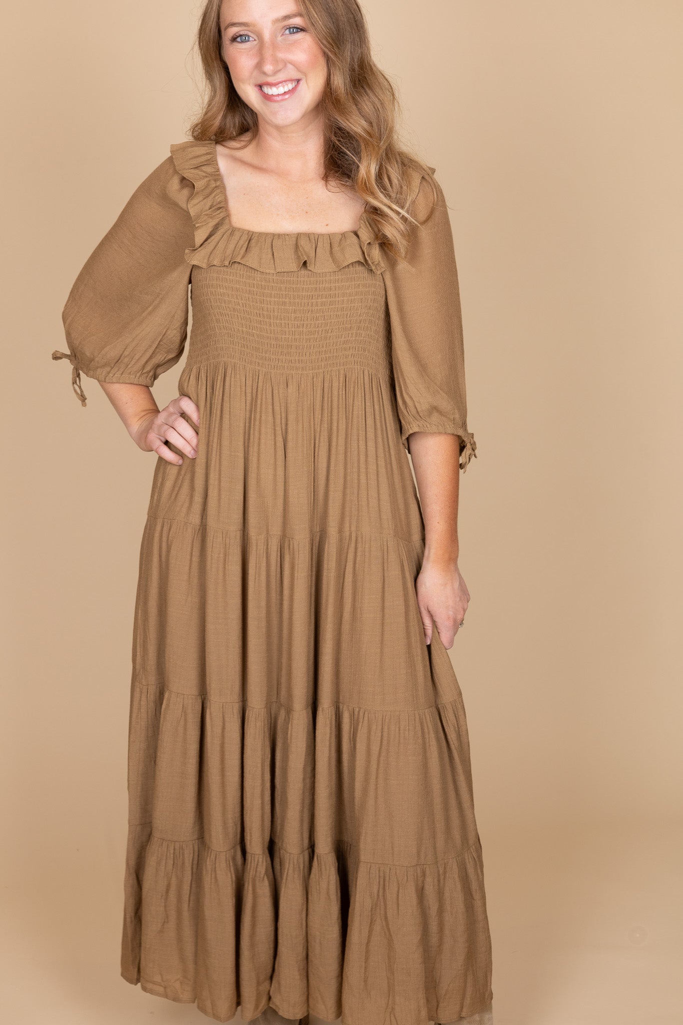 Women’s brown ruffle midi dress with puff sleeves and smocked bodice — fall chestnut dress from ELLX Boutique