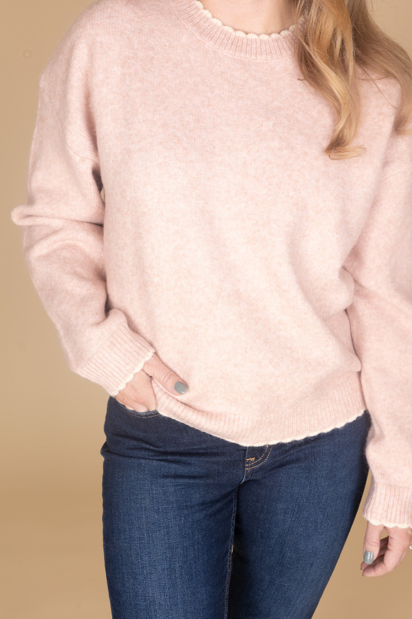close up detail of Women’s pastel pink scalloped knit sweater with cream trim — soft, feminine knit top from ELLX Boutique